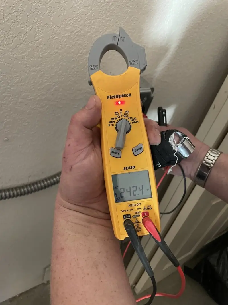 Voltage testing with clamp meter during Recessed Lighting Installation in North Plains